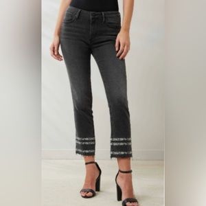 Black Driftwood High Rise Flare Jeans with fun snake print on bottom